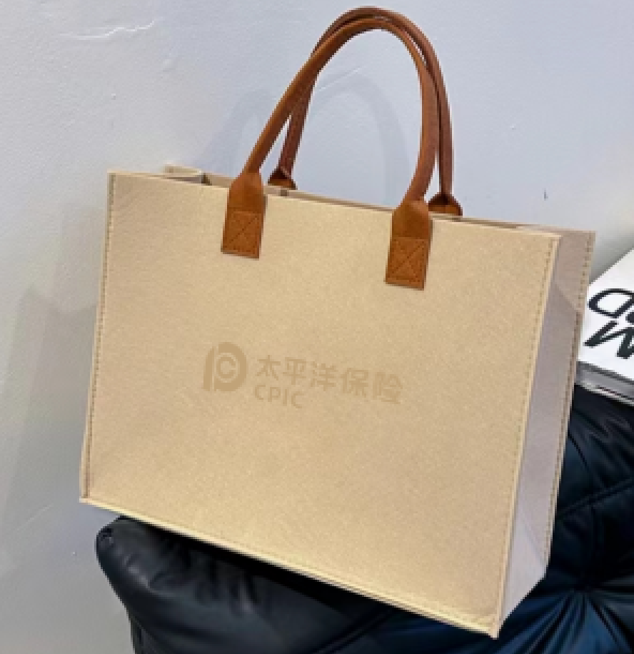 【太保形象品】太平洋皮质手提毛毡包